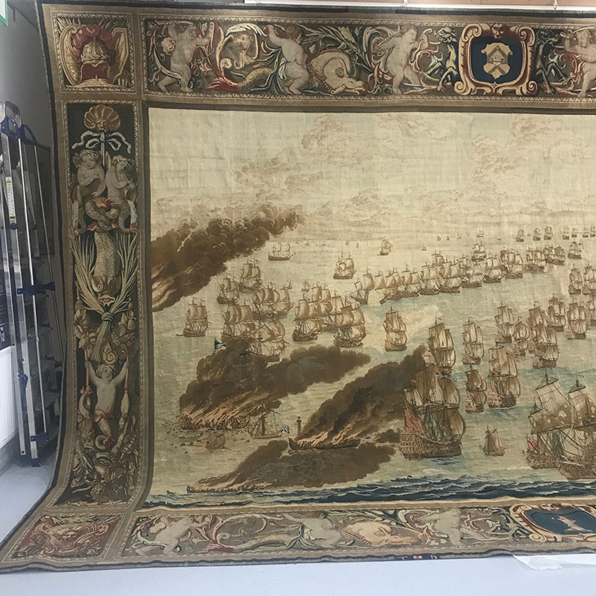 The Solebay Tapestry hanging in Zenzie Tinker Conservation Studio in Brighton © Zenzie Tinker Conservation Ltd.