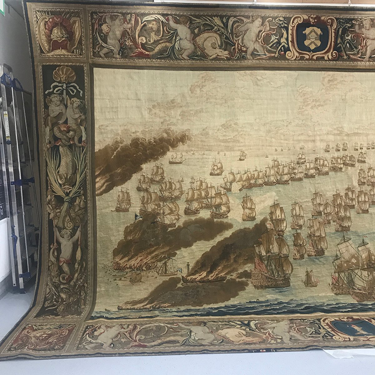 The Solebay Tapestry hanging in Zenzie Tinker Conservation Studio in Brighton © Zenzie Tinker Conservation Ltd.