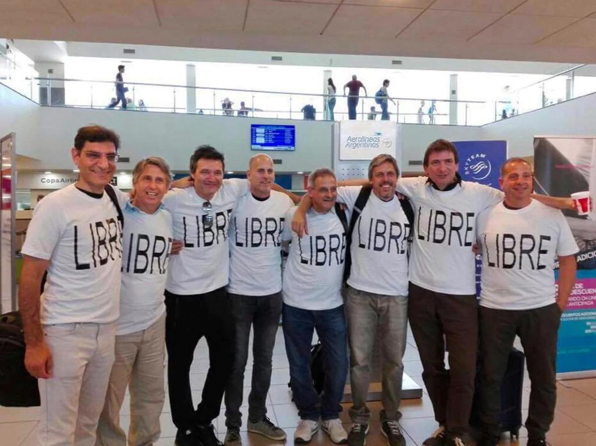 Hernán Ferruchi (far left), poses with his friends on 28 October before their flight from Argentina to New York Courtesy of Trevisan family via AP