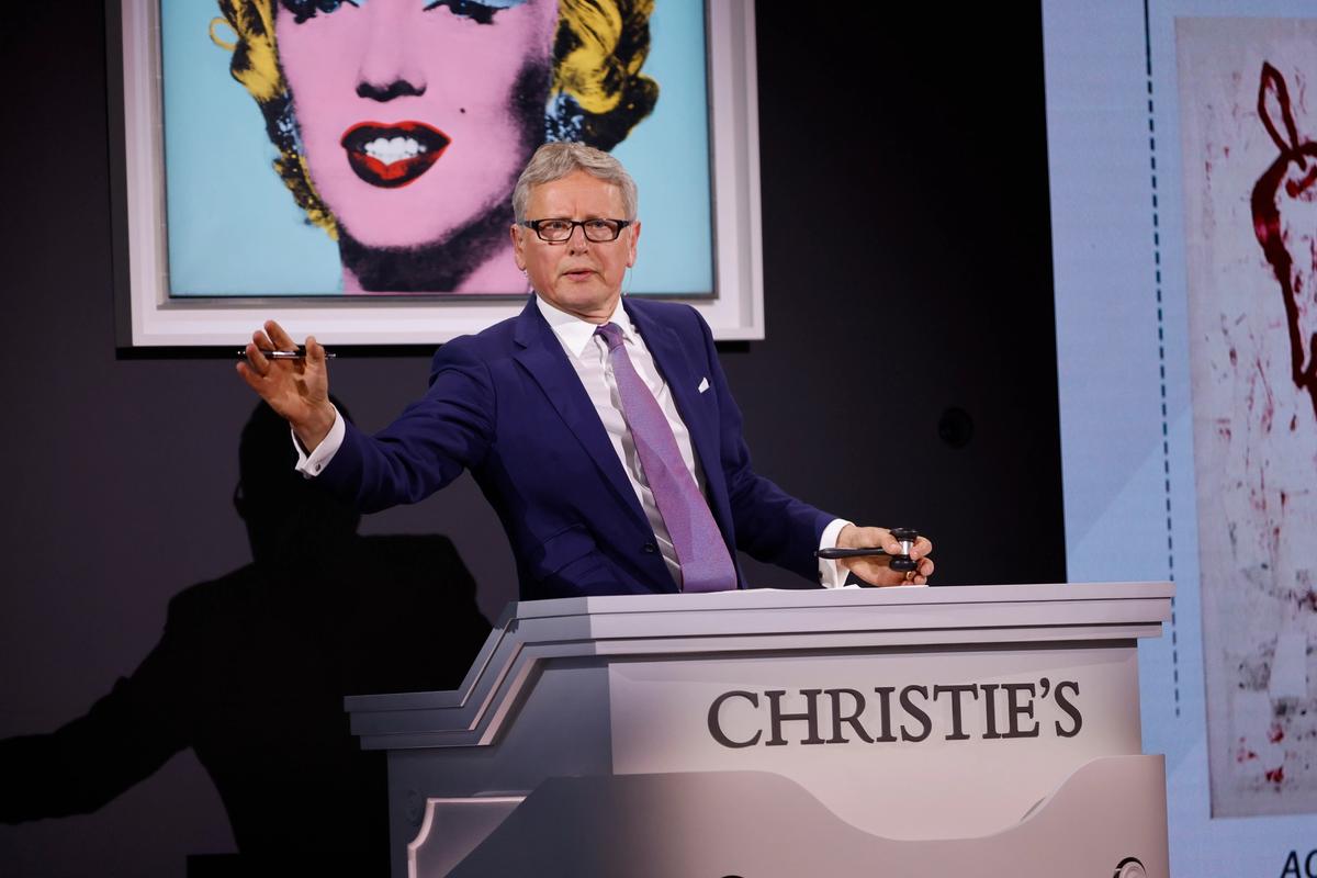 Jussi Pylkkänen at the rostrum during the 2022 sale of the Thomas and Doris Ammann collection at Christie's New York. Courtesy Christie's