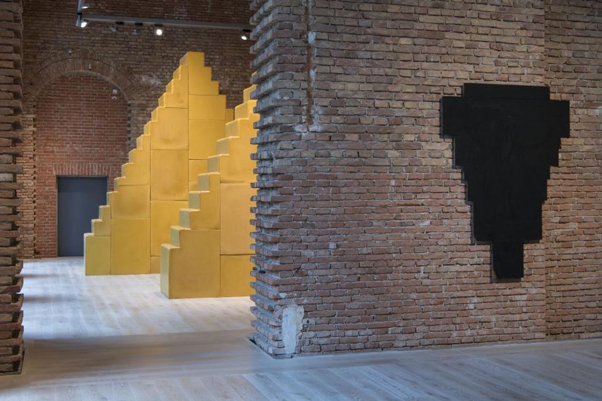 Wolfgang Laib’s pair of 4m-high beeswax ziggurats and Arnulf Rainer's Kreuz Schwarz (cross black, 1969) © Bayerische Staatsgemäldesammlungen/Wolfang Laib/Arnulf Rainer