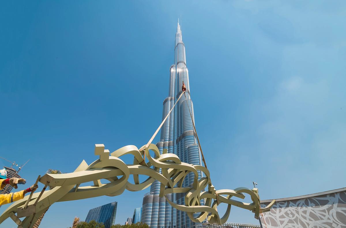 eL Seed’s new works in front of the Burj Khalifa in Dubai Christina Dimitrova. Courtesy of eL Seed studio