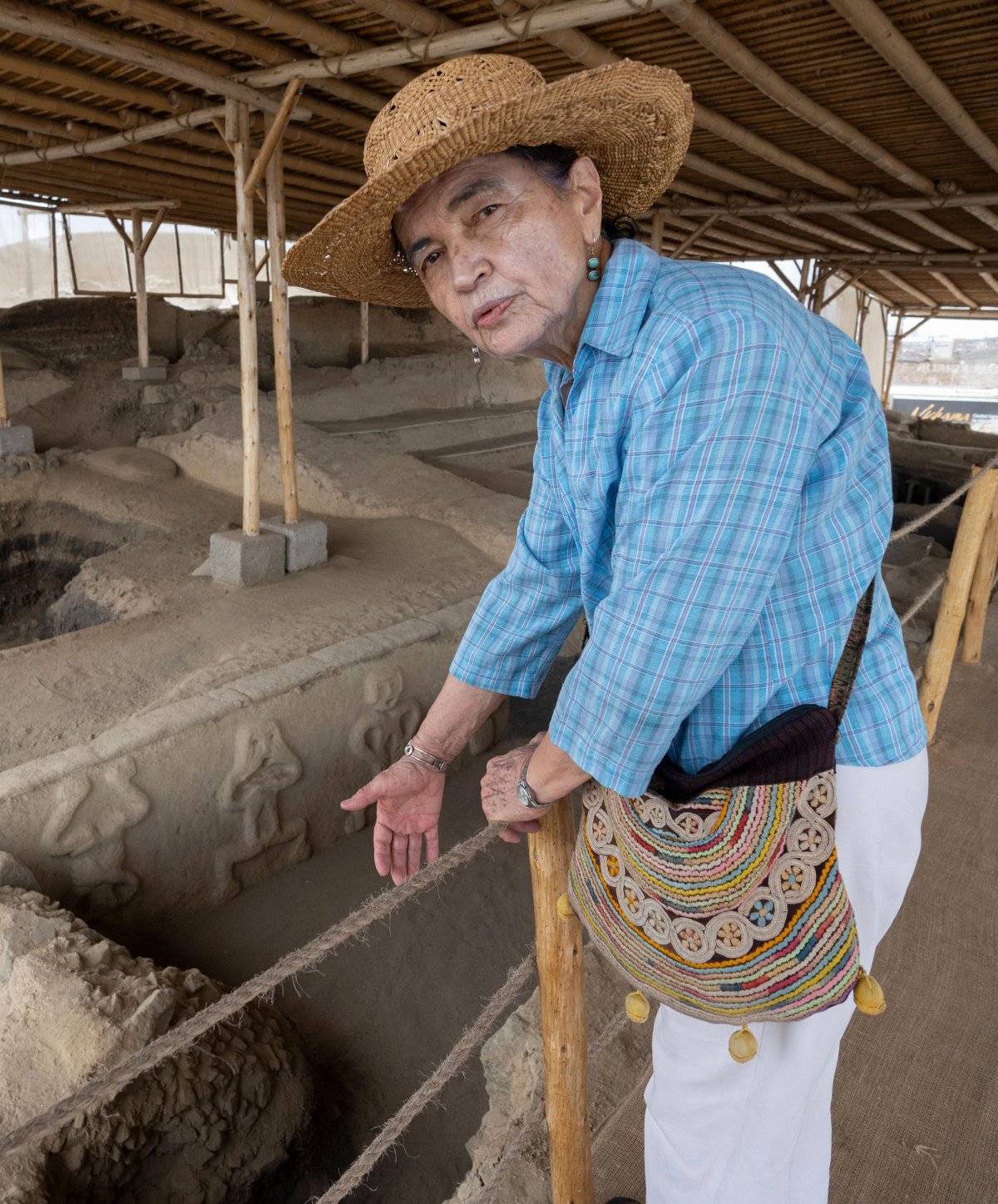 Archaeologist Ruth Shady discovered the Caral sites in Peru in 1994 and has been studying them ever since. She uncovered sobering facts about climate change, represented here by a frieze of people starving due to drought Cris Bouroncle/AFP via Getty Images