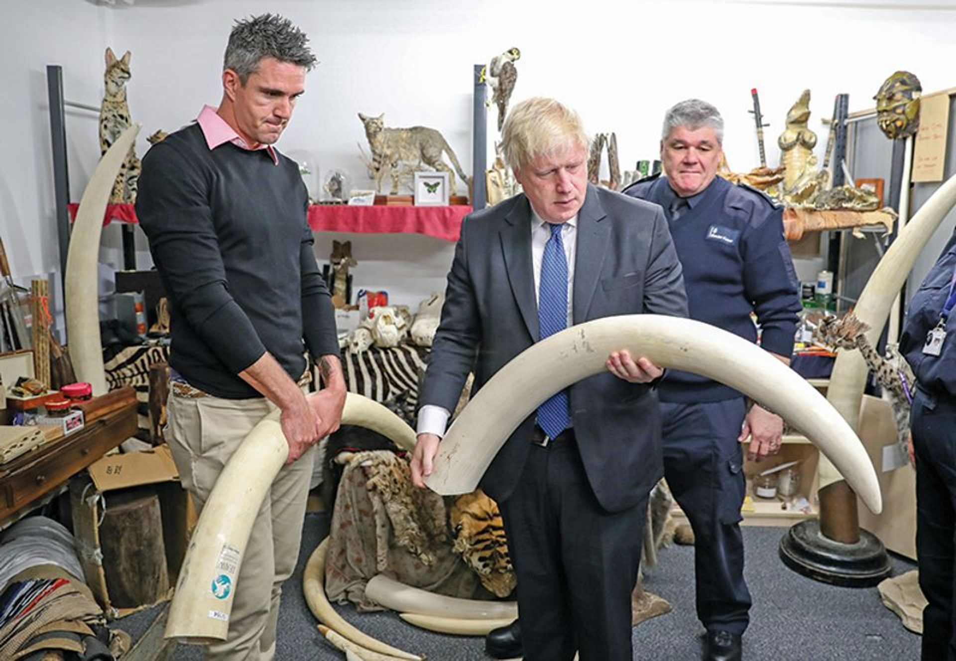 UK politicians such as Boris Johnson—pictured with former England cricketer Kevin Pietersen (far left)—think they are stopping the trade in “bloody tusks”, but the UK trade in new ivory is negligible compared with antique worked items like this veneered tea caddy of around 1800 © Andrew Matthews/Pool via Reuters