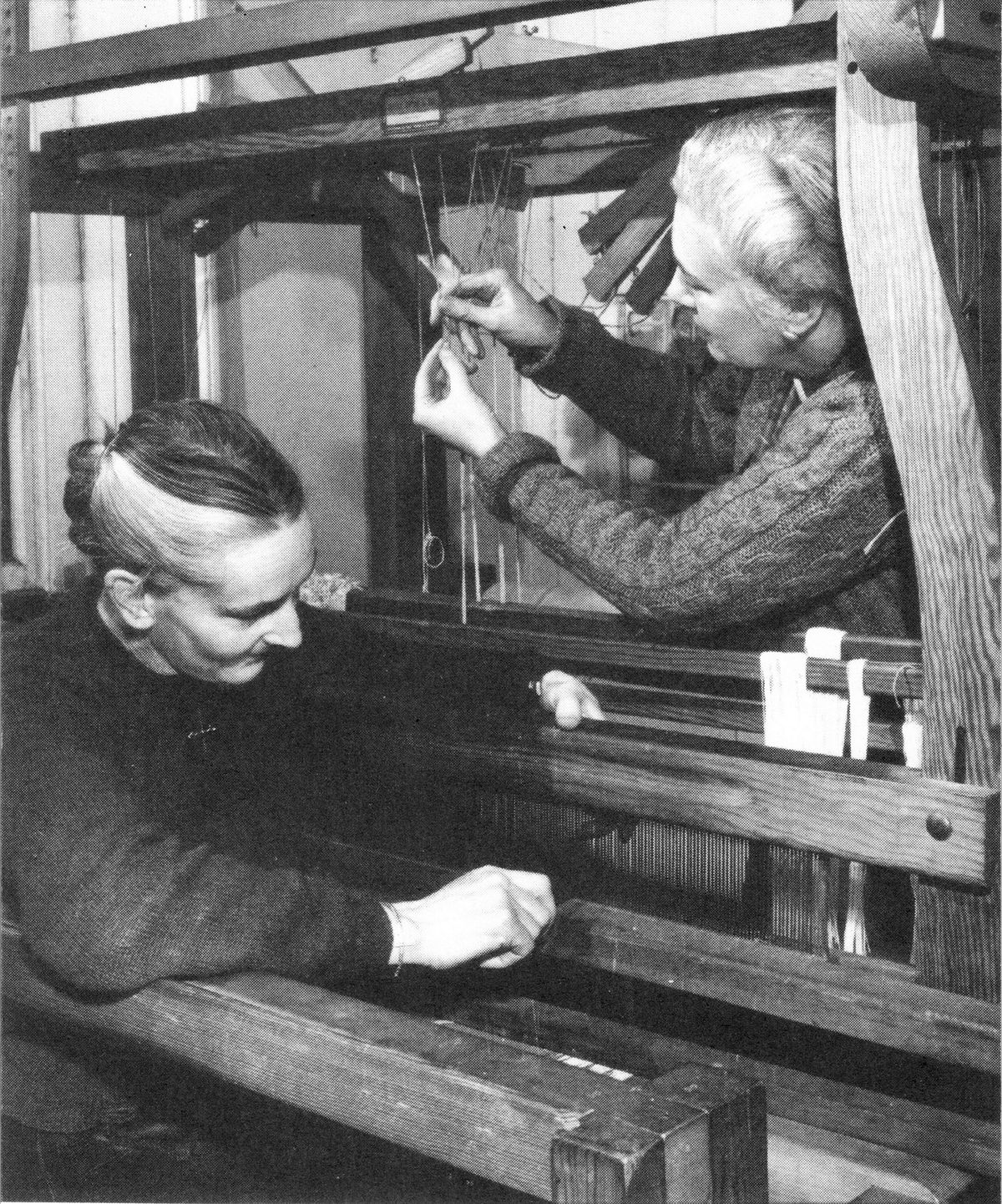 Hilary Bourne (left) and Barbara Allen in 1951, setting up a loom. As with so many other women in the shadows, the work and life of the couple could not be revealed, let alone celebrated The Ditchling Museum of Art + Craft
