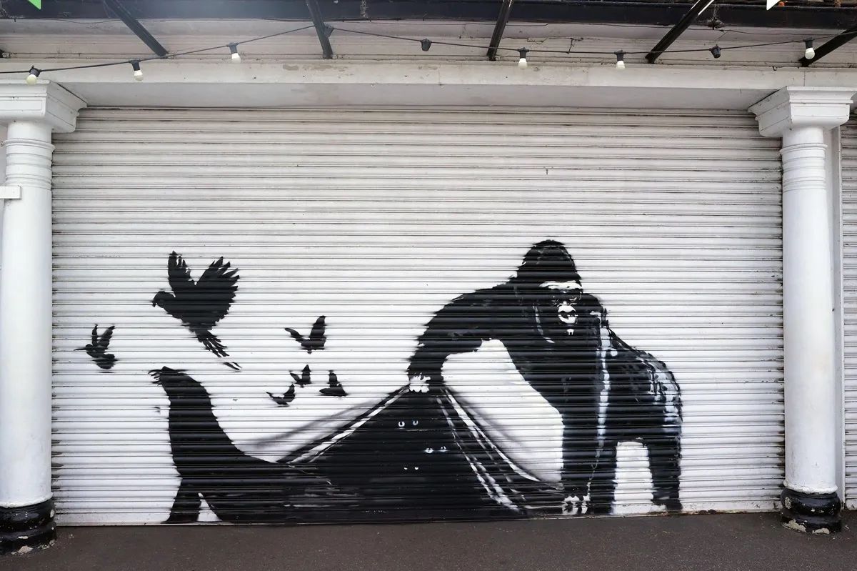 The gorilla work was painted onto the security shutters at the entrance of London Zoo but has since been replaced with a replica

PA Images / Alamy Stock Photo