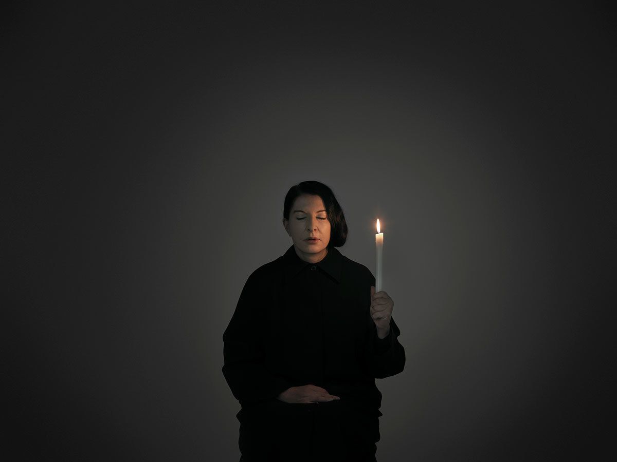 Marina Abramovic, Artist Portrait with a Candle (A), from the series With Eyes Closed I See Happiness (2012) Courtesy of the Marina Abramovic Archives © Marina Abramovic