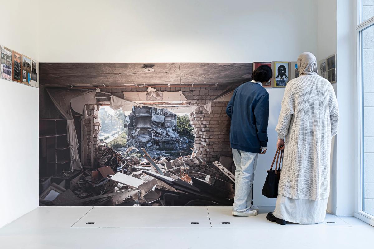 Visitors at the exhibition Contemplating the Empathy of Others at Stadtgalerie Künstlerhaus Lauenburg. The show centres around Red Horse, a photo collage project by artist Sasha Kurmaz that shows how life in Ukraine is being transformed by the war
Courtesy of Assortymenta Kimnita