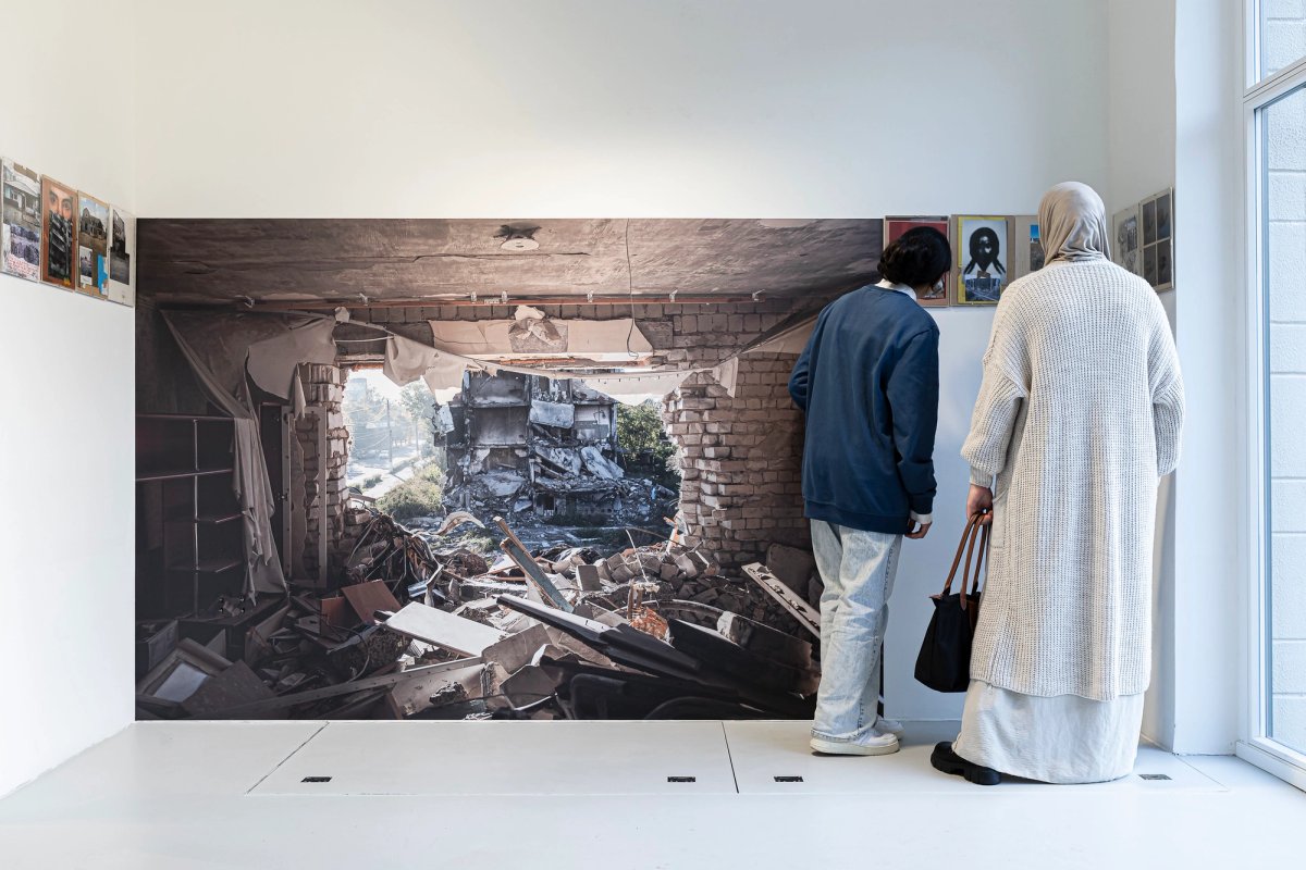 Visitors at the exhibition Contemplating the Empathy of Others at Stadtgalerie Künstlerhaus Lauenburg. The show centres around Red Horse, a photo collage project by artist Sasha Kurmaz that shows how life in Ukraine is being transformed by the war
Courtesy of Assortymenta Kimnita