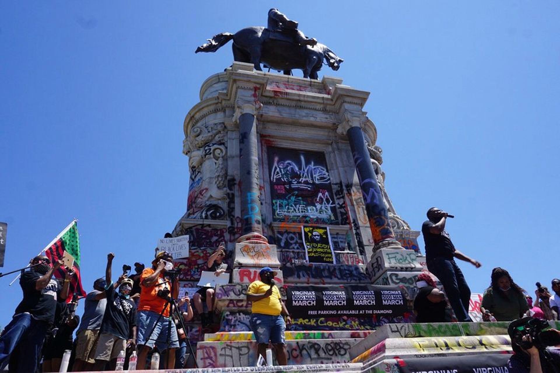 Protesters in Richmond, Virginia demonstrating against racial injustice and police brutality next to a statue of the Confederate general Robert E. Lee Artur Gabdrahmanov/Sputnik via Associated Press