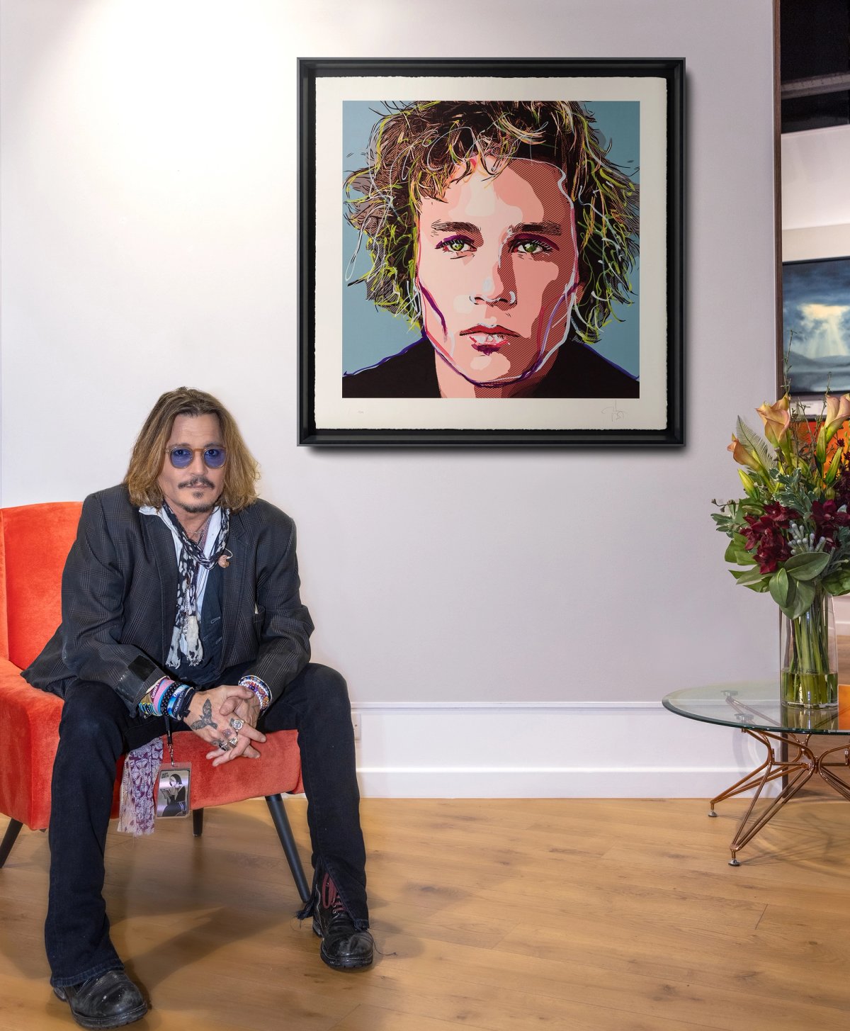 Johnny Depp with his portrait of Heath Ledger
Photo: Elliot Nyman