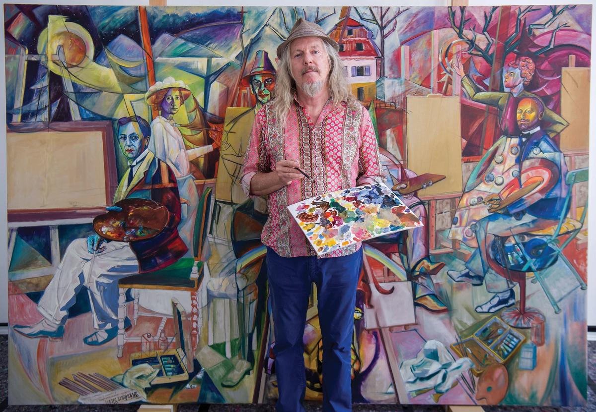 The painter Wolfgang Beltracchi stands in front Gruppenbild der blauen Reiter (group picture of the blue riders), a painting he is working on in Munich, Germany, 24 August 2017 Photo: Peter Kneffel/dpa/Alamy Live News