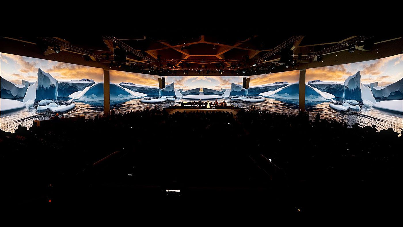 A previsualisation by Refik Anadol Sudio of the opening concert of the World Economic Forum's Annual Meeting 2025. The concert will merge Anadol's AI-generated immersive visuals from Large Nature Model: Glacier with electronic soundscapes and orchestral music Refik Anadol Studio, 2024