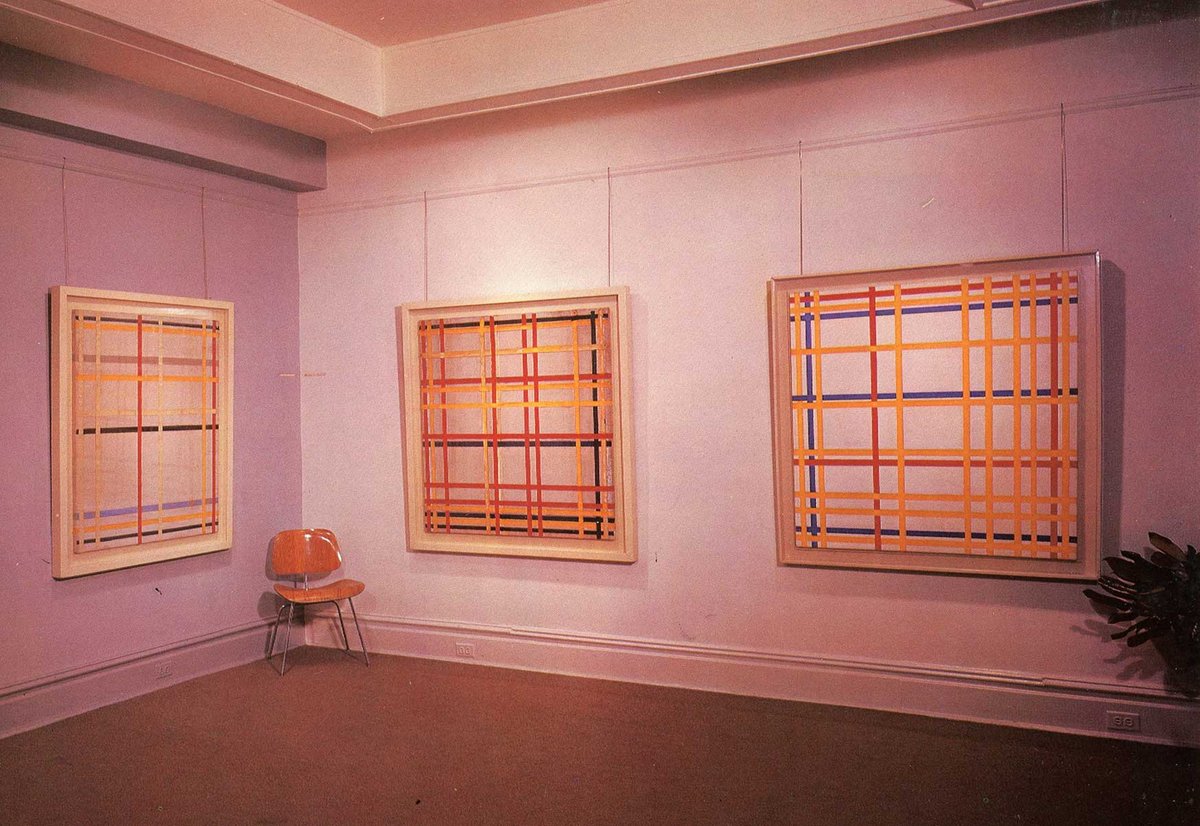Mondrian’s 1962 exhibition at the Sidney Janis Gallery, which shows the painting (central) the “right” way up
Courtesy of Carroll Janis