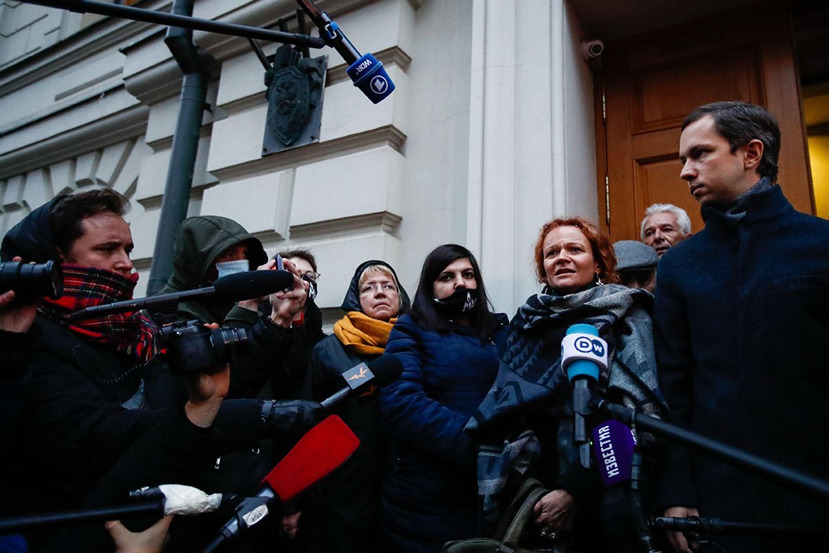 Right to left: Public and political activist Lev Ponomarev, journalist and attorney Maria Eismont, Memorial Human Rights Centre lawyer Tamila Imanova and International Memorial executive director Elena Zhemkova talk to journalists outside the Supreme Court of Russia