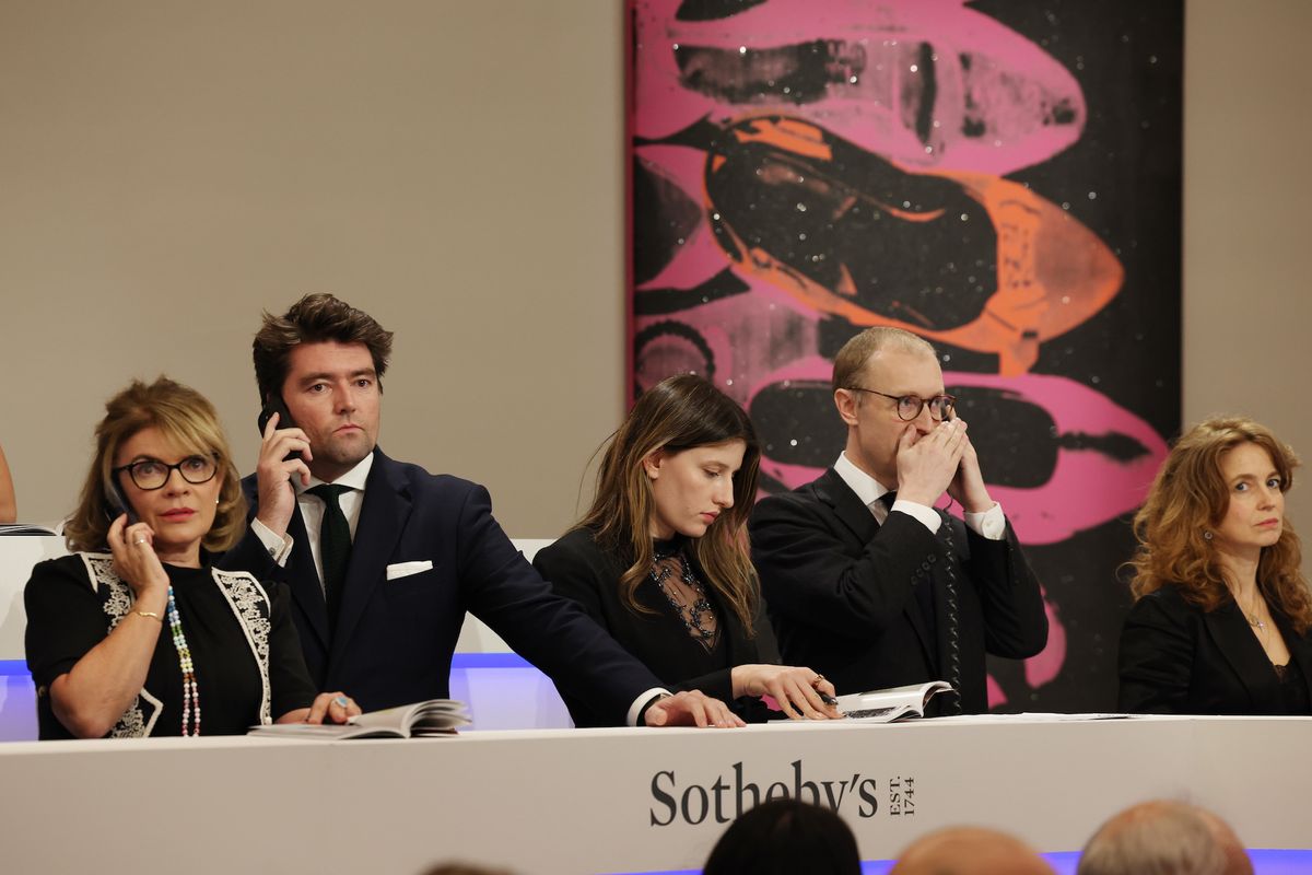 Sotheby's specialists during the auction house's evening sale of contemporary art on 12 October Courtesy Sotheby's