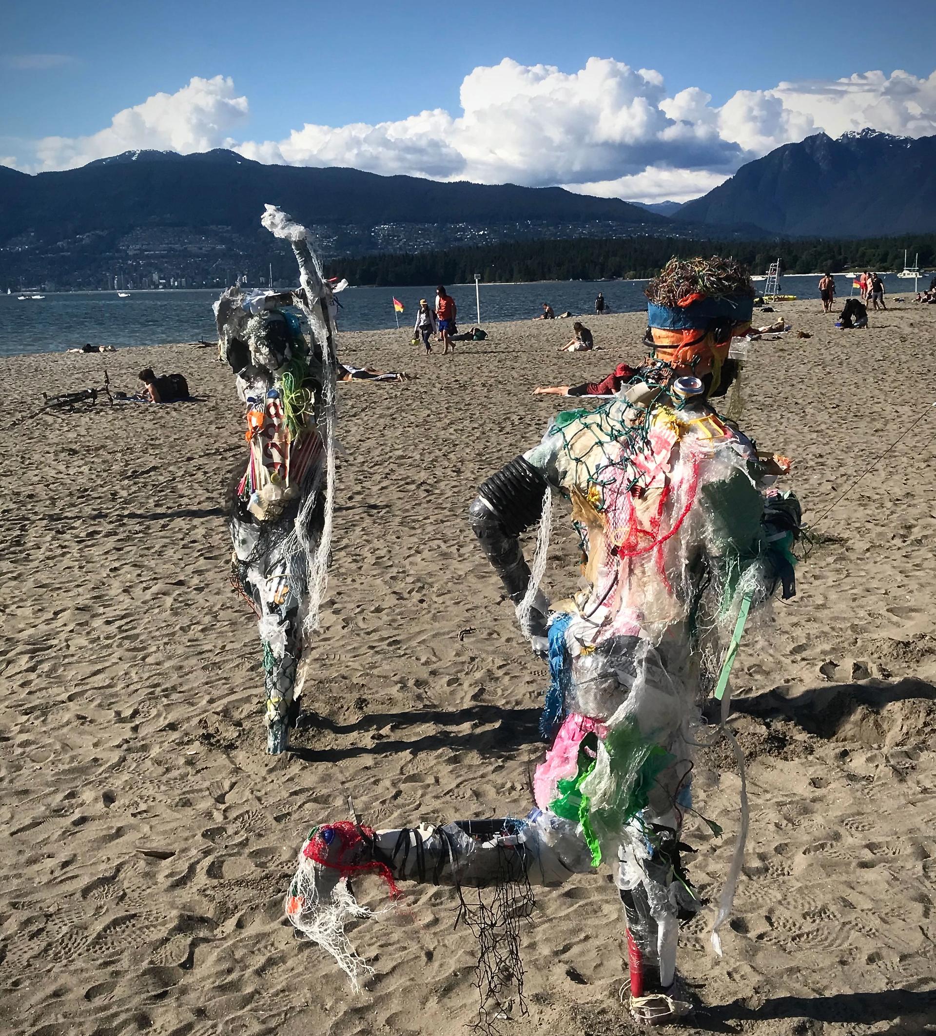 Caitlin Doherty's installation of figures made of sea trash on the beach in Kitsilano, Vancouver Photo: Hadani Ditmars