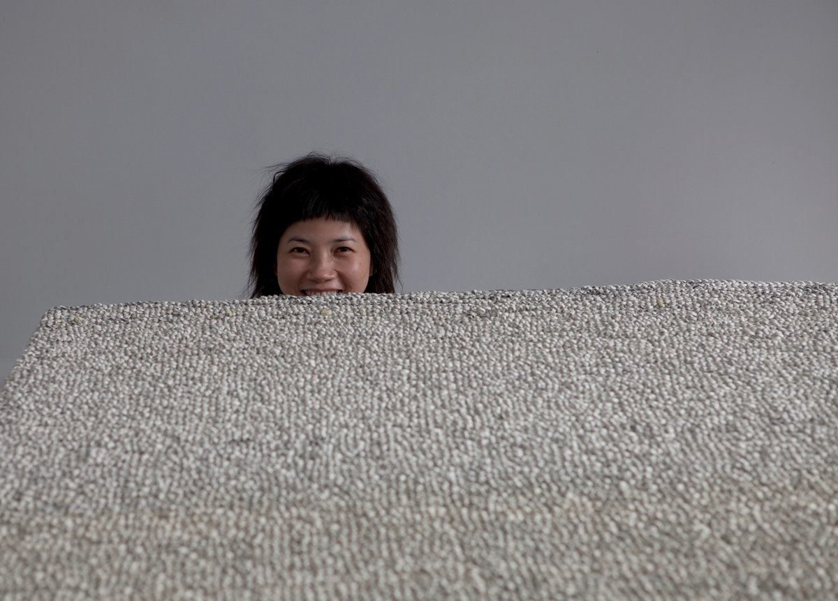 Chen has spent decades perfecting her technique of weaving shreds of paper with knitting needles © Clément Ledermann