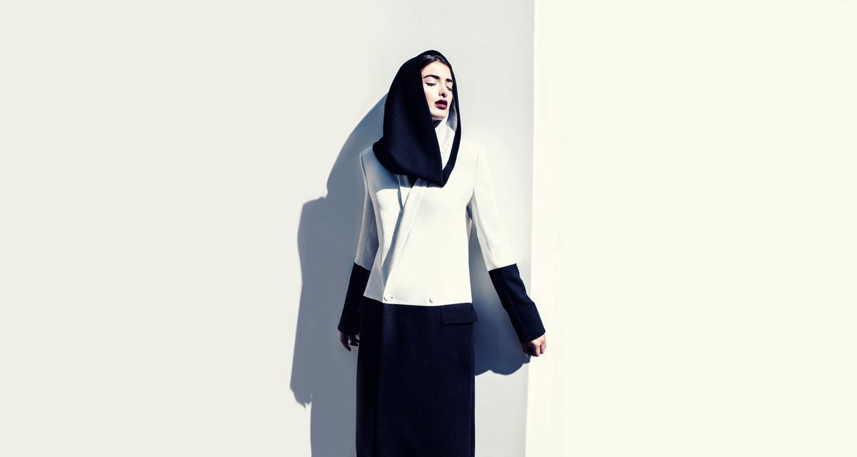 This two-toned crepe hood (2014) by Faiza Bouguessa is one of 80 garments on show Courtesy of Faiza Bouguessa