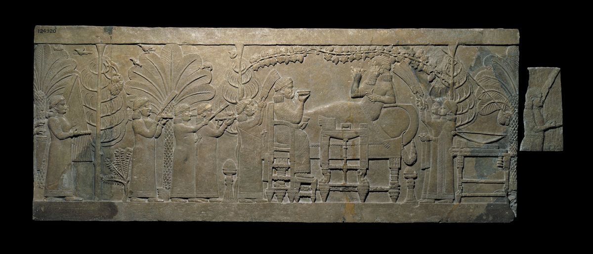 The Banquet Scene relief from the North Palace of Ashurbanipal, Nineveh, Iraq (around 645 BC) is widely regarded as the world's finest single relief panel from Assyria © The Trustees of the British Museum