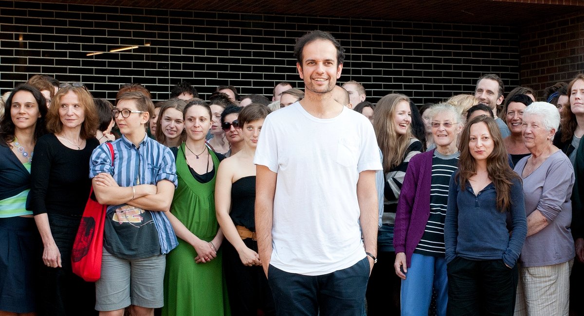 Tino Sehgal at Tate Modern with his interpreters for These associations, 2012 Photo: courtesy of Gabrielle Fonseca Johnson, Tate Photography 2012