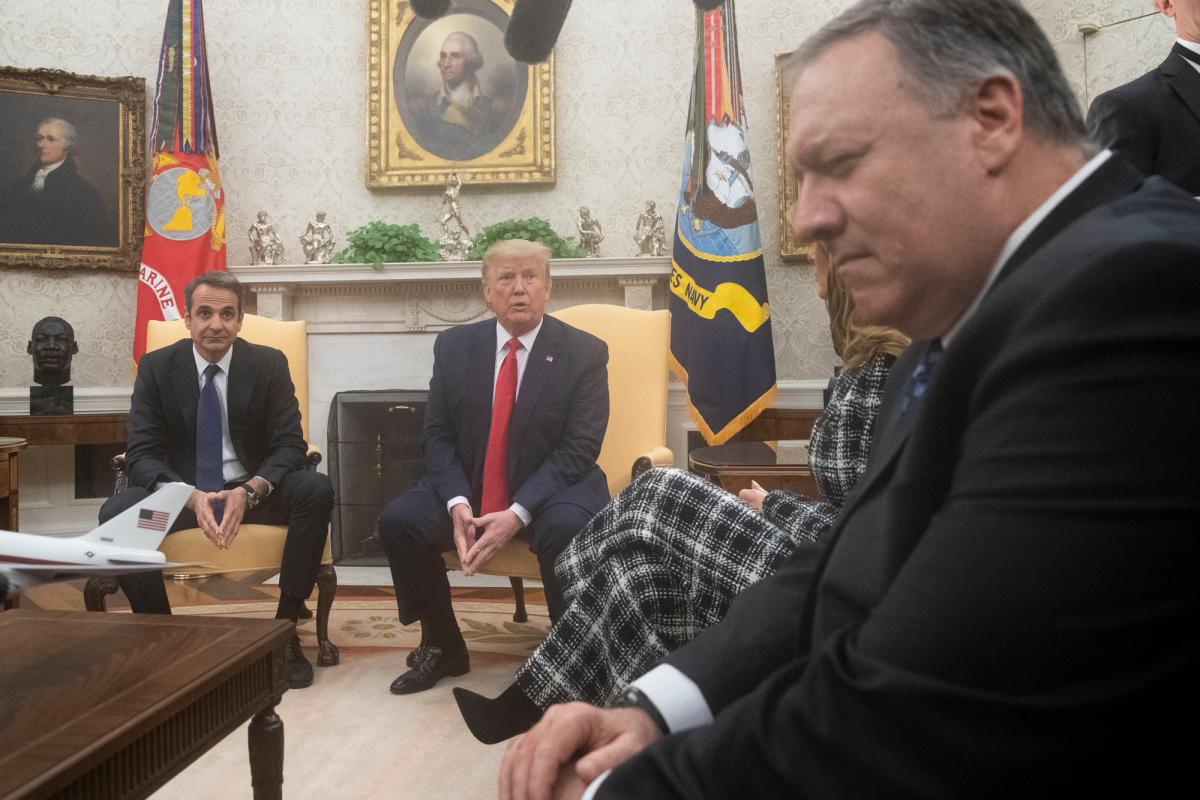 US President Donald Trump spoke during a meeting in the Oval Office of the White House, with Greek Prime Minister Kyriakos Mitsotakis, left, and Secretary of State Mike Pompeo, far right AP Photo/Alex Brandon