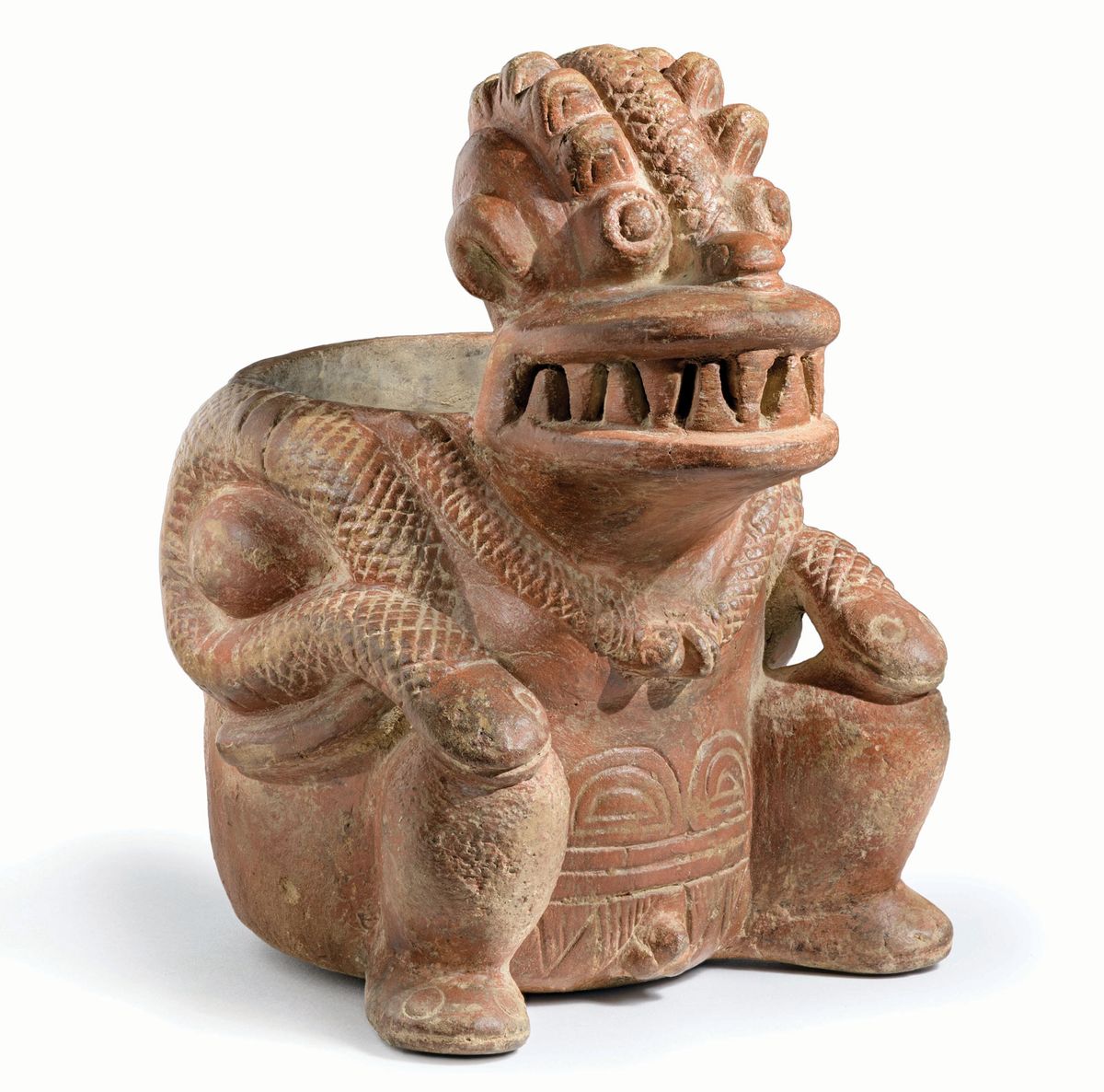 A basket carrier (canastero) with fangs and serpents (1500BC–AD100) from the Calima region of Colombia Photo: © Museum Associates/Lacma