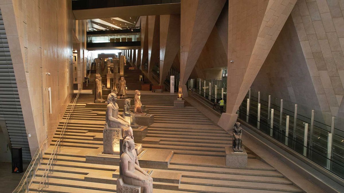 The grand staircase of the Great Egyptian Museum, which opens onto a view of the Giza pyramid complex. The official opening of the museum has been beset by multiple delays

Photo © Grand Egyptian Museum
