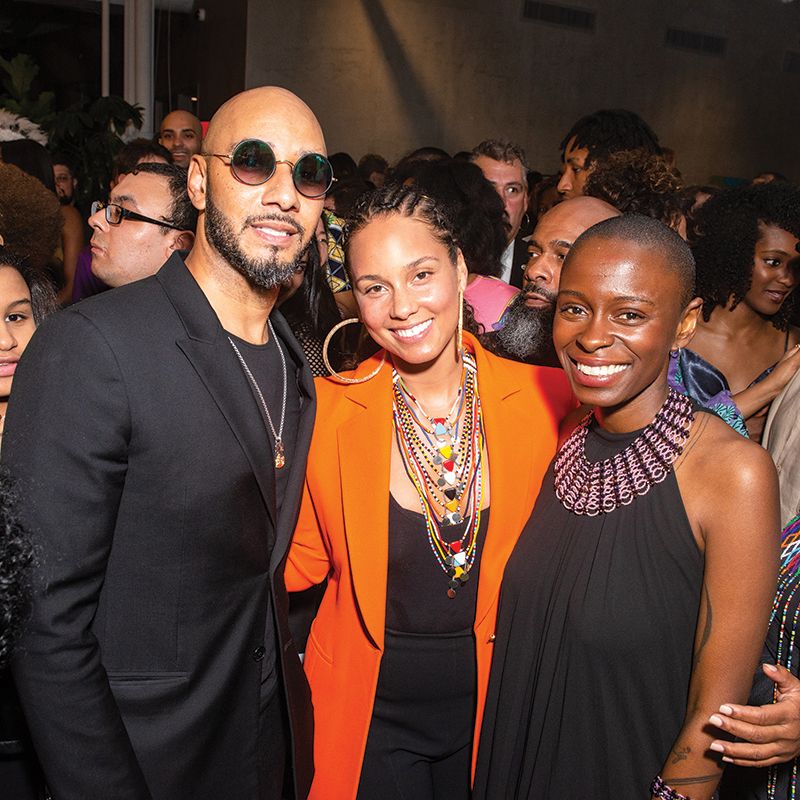 The musical couple Swizz Beatz and Alicia Keys  (left) with  Rees Visionary Award-winning artist Toyin Ojih Odutola Madison McGaw/BFA.com