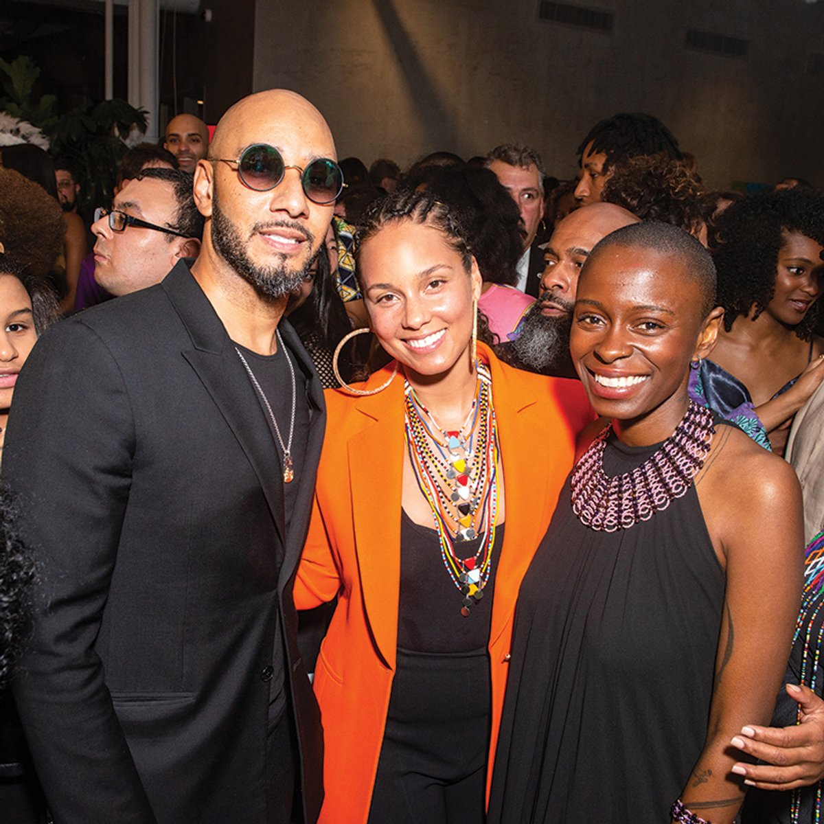 The musical couple Swizz Beatz and Alicia Keys  (left) with  Rees Visionary Award-winning artist Toyin Ojih Odutola Madison McGaw/BFA.com