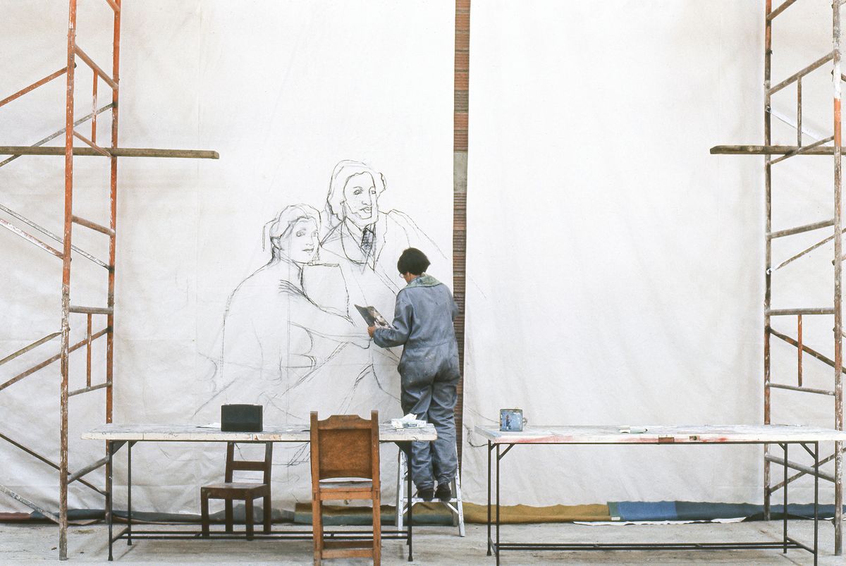 Beatriz González working on her 1978 acrylic-on-fabric painting, Telón de la móvil y cambiante naturaleza
Photo: Andrés Pardo; Collection Beatriz González