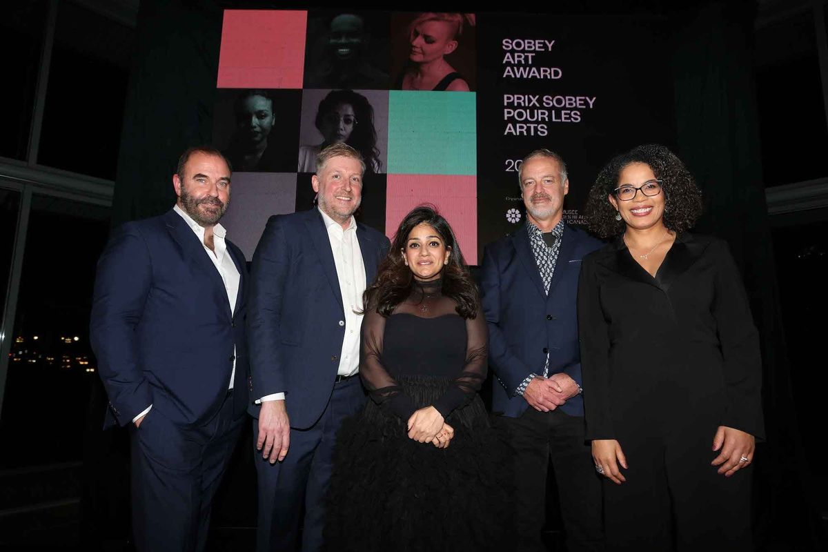 2022 Sobey Art Award winner Divya Mehra surrounded by, from left to right, Bernard Doucet, executive director of the Sobey Art Foundation; Jonathan Shaughnessy, director of curatorial initiatives at the National Gallery of Canada and chair of the jury; Rob Sobey, chair of the Sobey Art Foundation and Angela Cassie, interim director and chief executive of the National Gallery of Canada. Photo: National Gallery of Canada