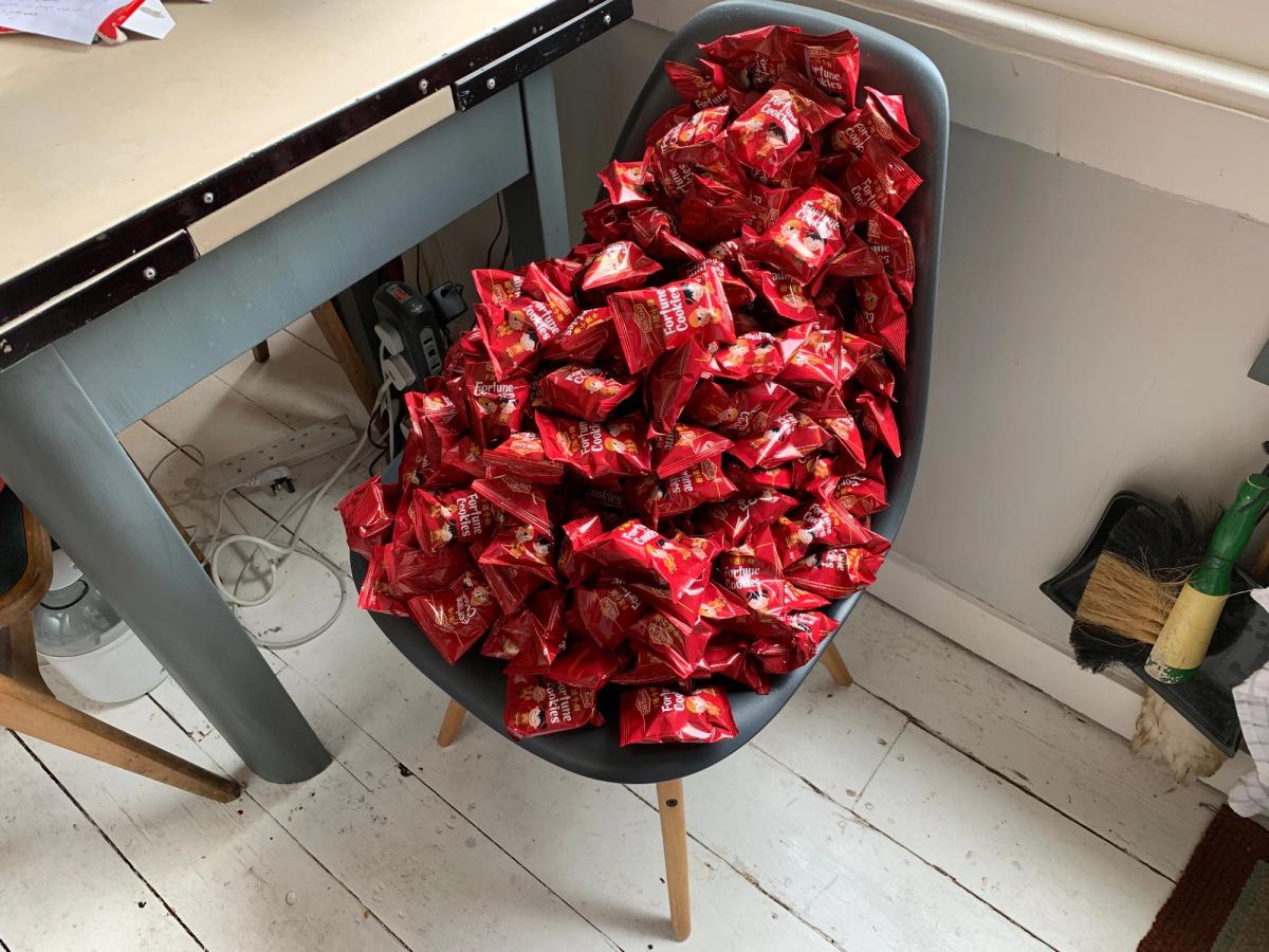 The kitchen chair was chosen as the best location for the stack of 271 fortune cookies Photo: Gareth Harris