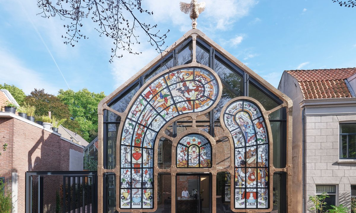 Dutch design studio update 19th-century Dordrecht church facade with a surreal glass sculpture balanced on four bronze turtles Dutch design studio update 19th-century Dordrecht church facade with a surreal glass sculpture balanced on four bronze turtles