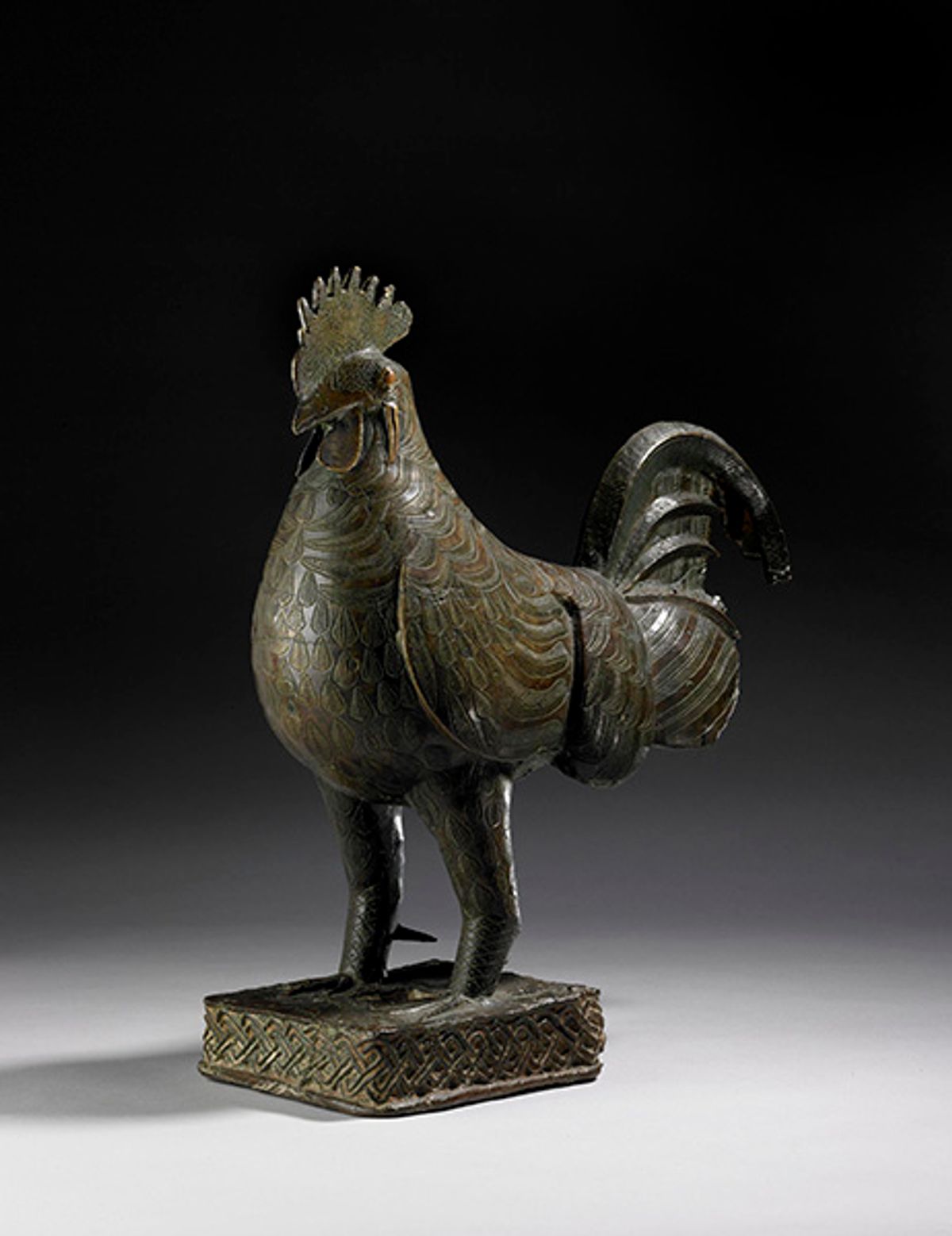 A 18th-century cast brass figure of a cockerel with punched feather decoration made in Benin City and in the British Museum's collection © The Trustees of the British Museum





