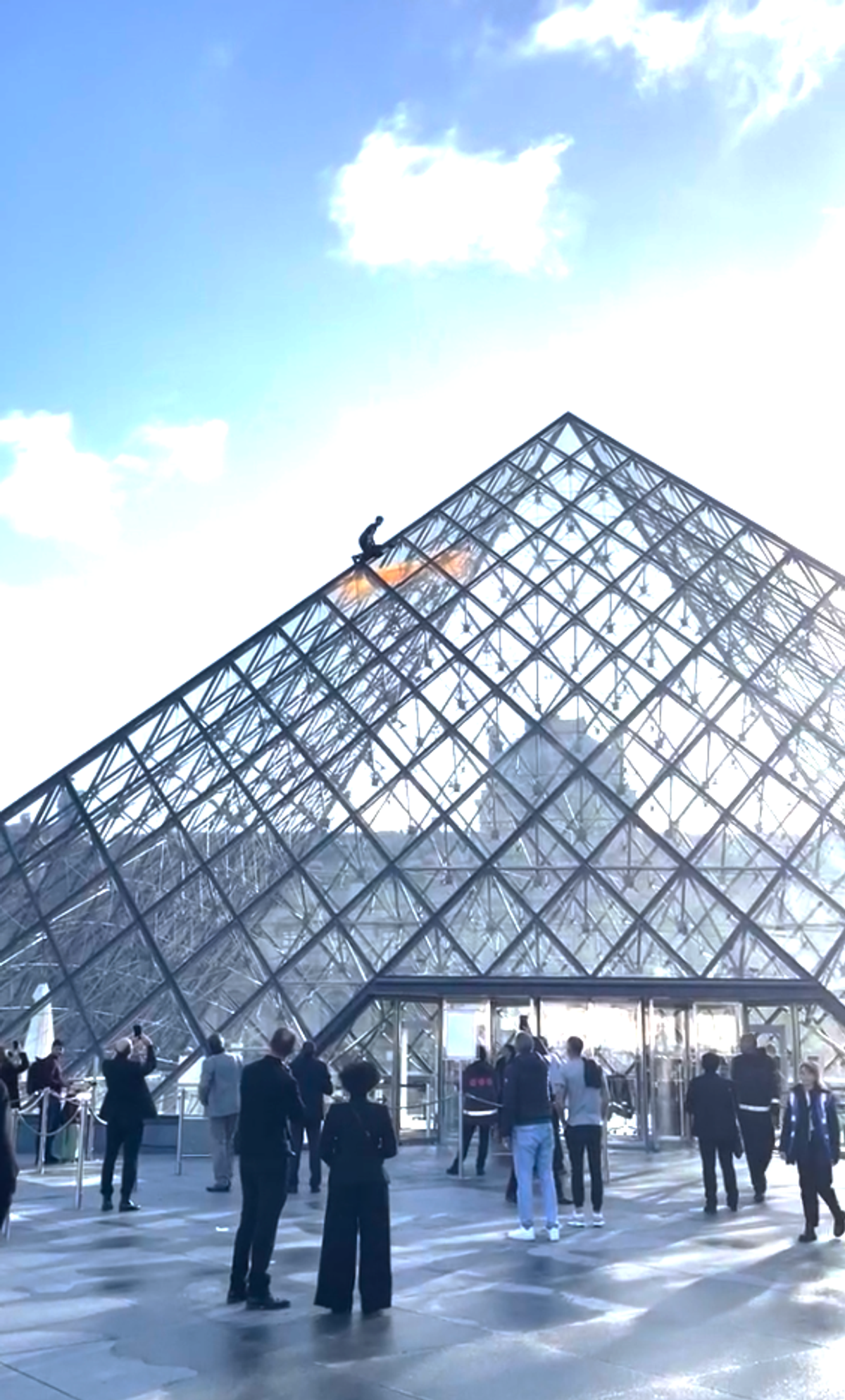 A climate activist from the protest group Dernière Rénovation scaled the monument using climbing equipment, a Musée du Louvre spokesperson says
Courtesy Dernière Rénovation