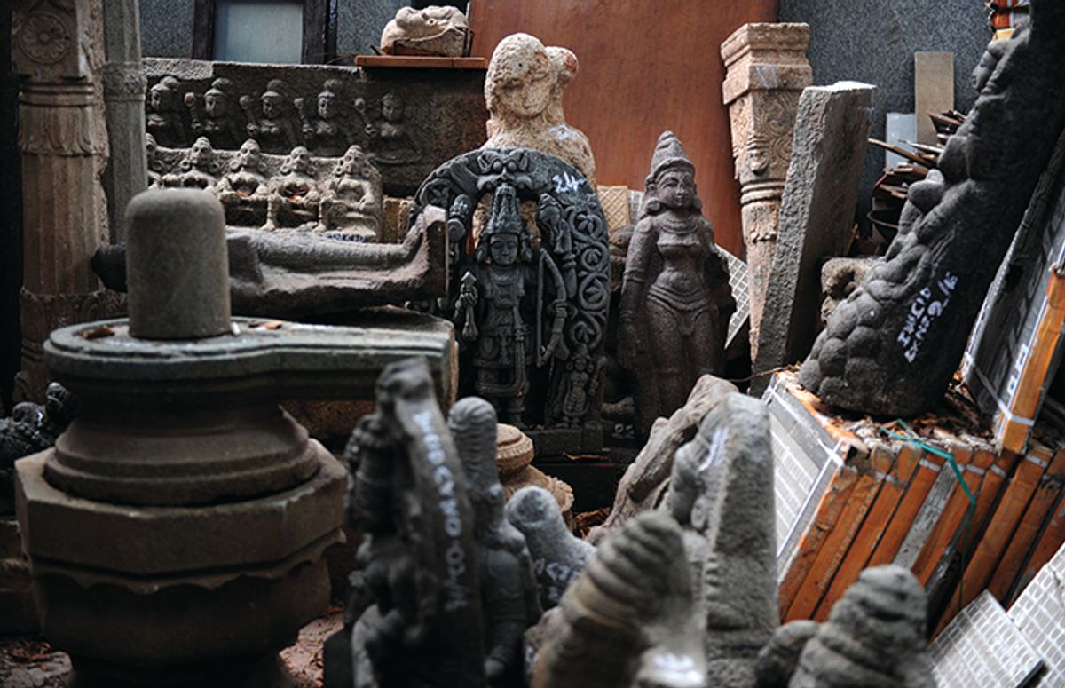 Some of the hundreds of artefacts recovered from an art dealer believed to have looted them from Hindu temples Arun Sankar/AFP via Getty Images
