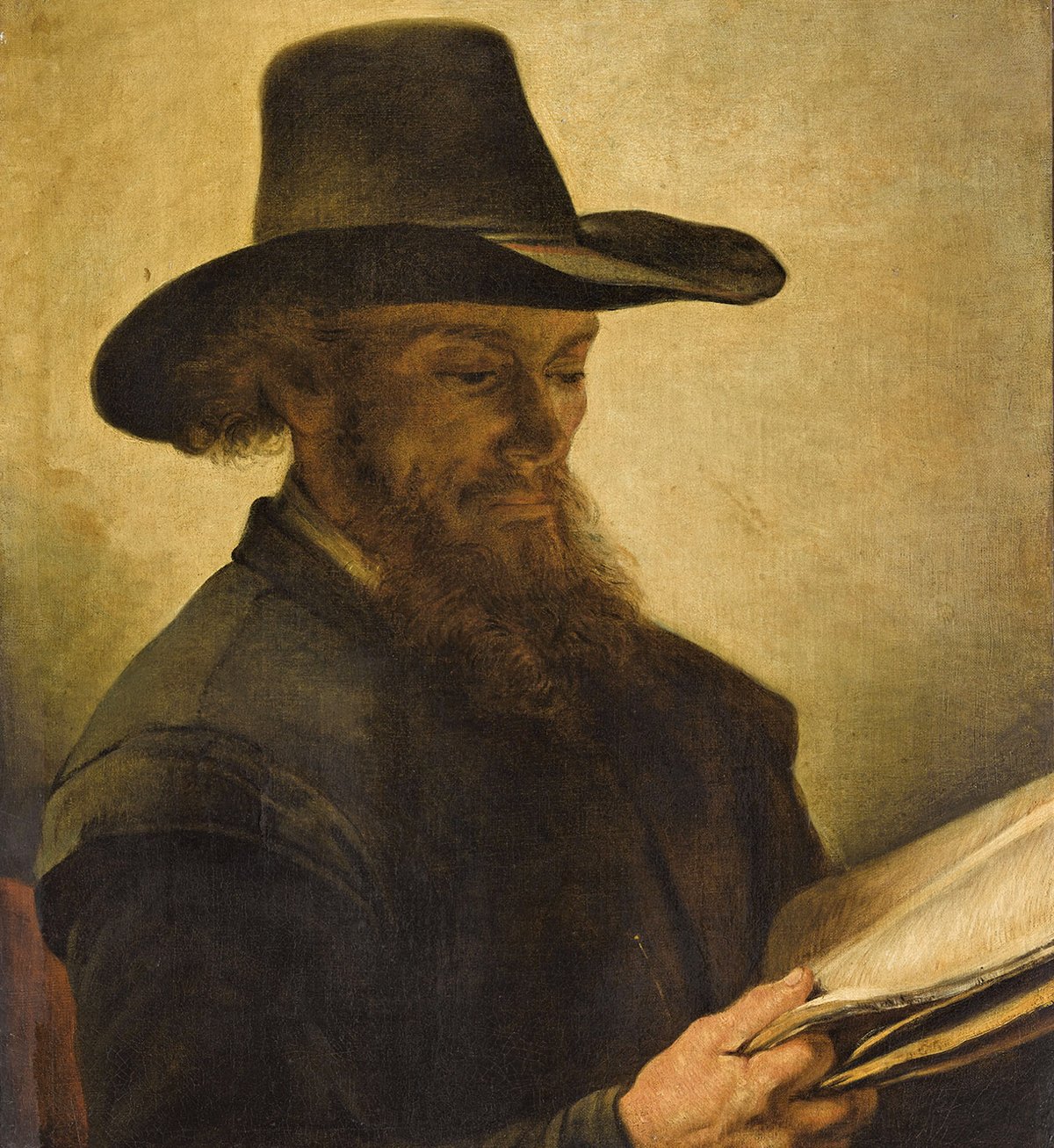 Barent Fabritius’s Man Reading (17th century) is one of the looted works on view at the Louvre RMN-Grand Palais (Musée du Louvre)/Franck Raux