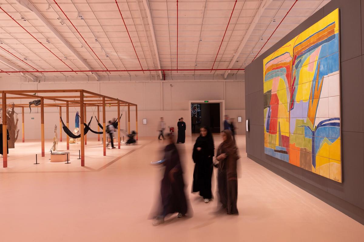 In Interludes and Transitions, Diriyah Contemporary Art Biennale 2026, installation view, left; Daniel Otero Torres, Echoes of the Earth (2026), right; Etel Adnan, Untitled (2020/2024). Photo by Alessandro Brasile, courtesy of the Diriyah Biennale Foundation.