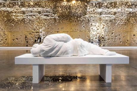  Maurizio Cattelan’s bullet-strewn gold installation in New York draws a connection between wealth and violence 