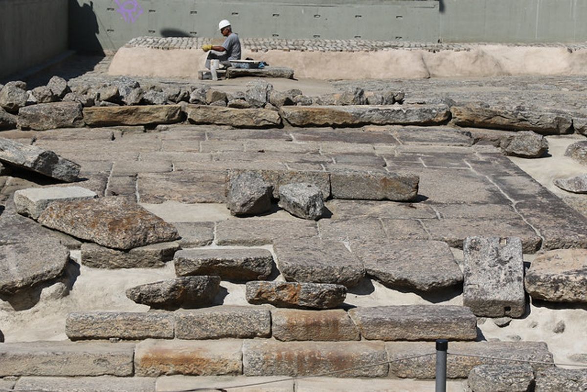 An archaeologist working in the ruins of the Valongo Wharf in Rio de Janeiro Iphan