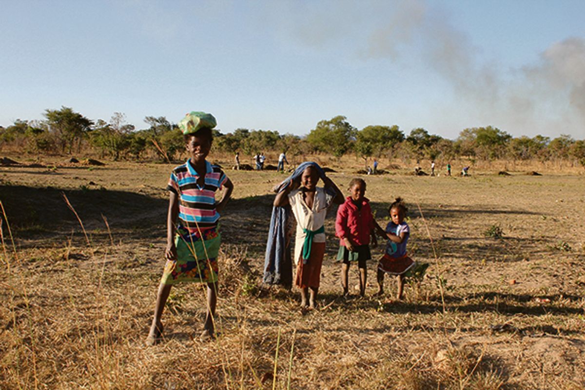 Children in Zambia, in front of the construction site of their new school Courtesy Selldorf Architects