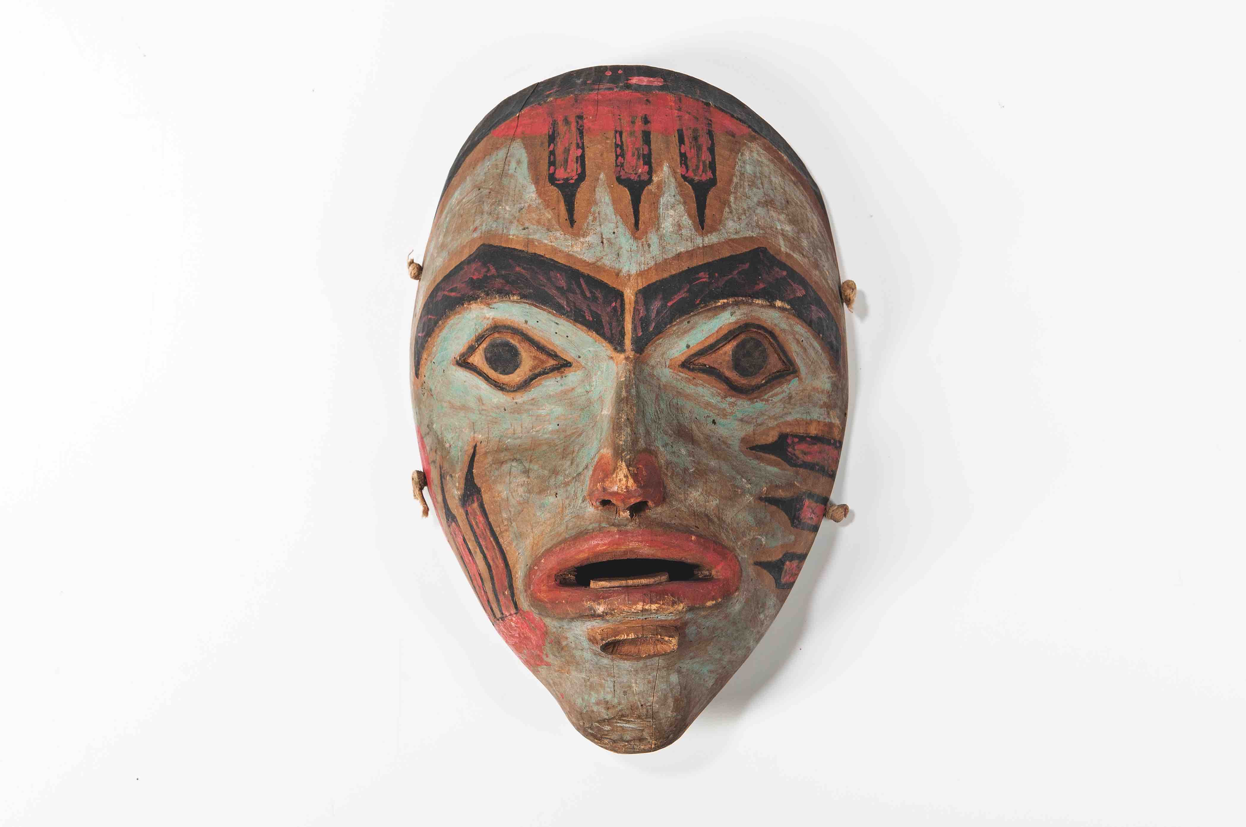 A female Northwest Coast mask (around 1860-70) pulled from Skinner's American Indian and Ethnographic Art on 1 December Skinner Auctioneers