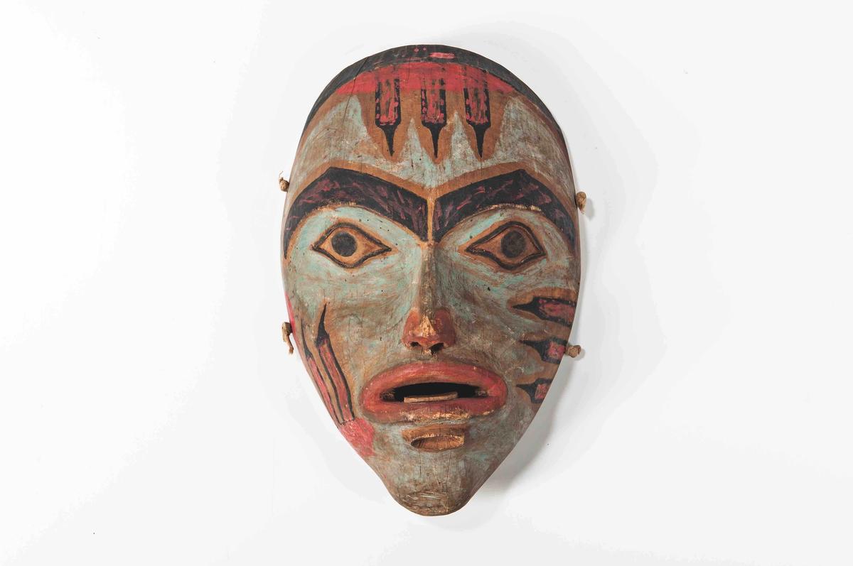 A female Northwest Coast mask (around 1860-70) pulled from Skinner's American Indian and Ethnographic Art on 1 December Skinner Auctioneers