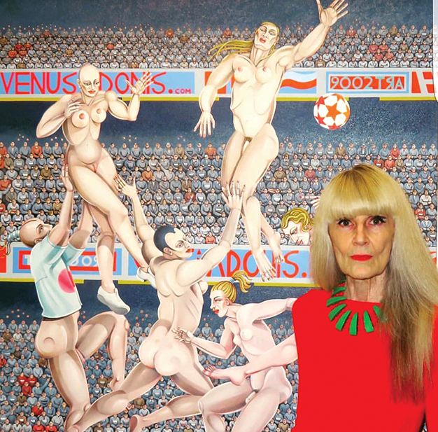 Caroline Coon with her painting  A Sweet Lob from 25 Yards (2006) at her exhibition at Tramps Gallery, London Courtesy Louisa Buck