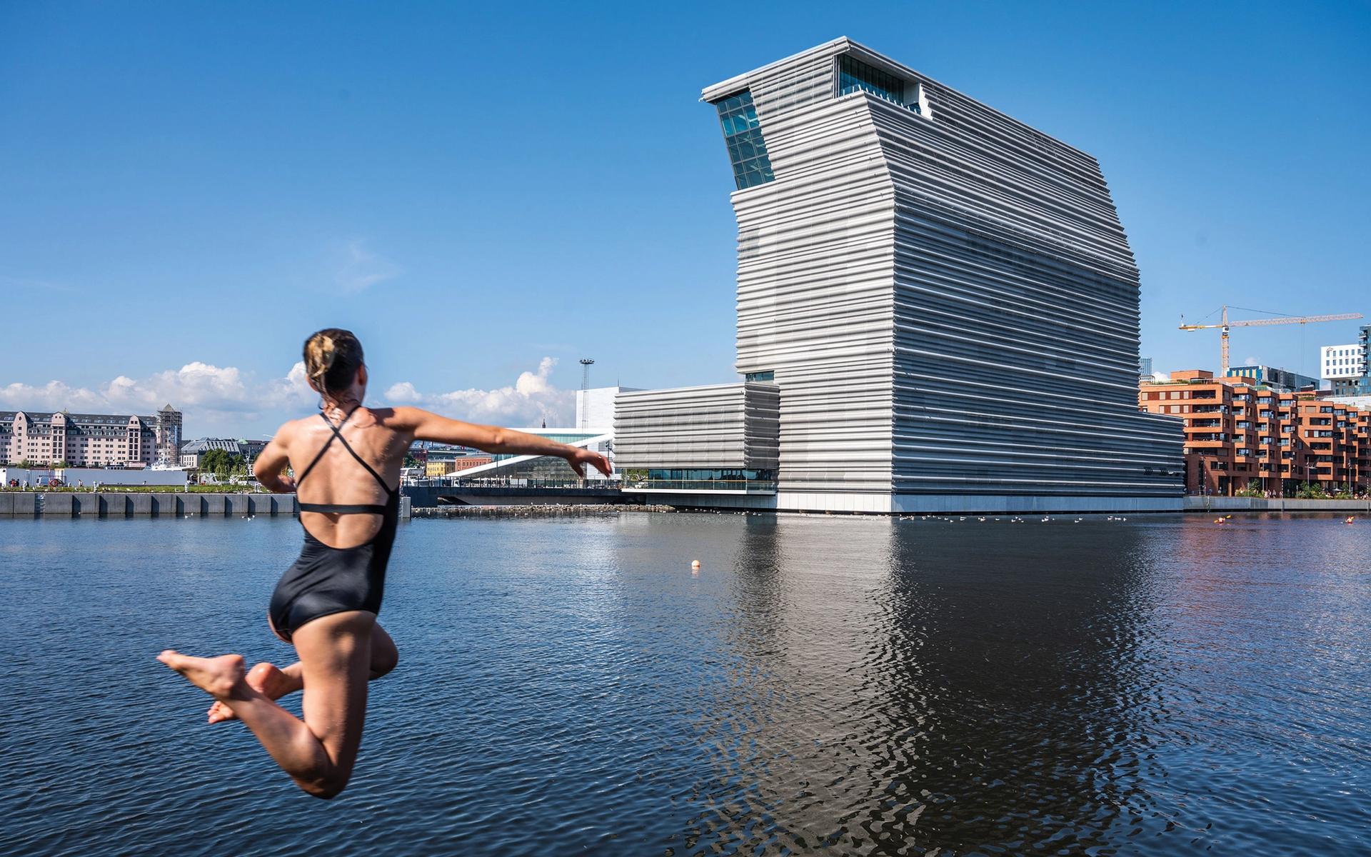 The new museum sits on Oslo’s bay of Bjorvika and promises sweeping views of the city. The waterfront location proved a magnet for swimmers this summer © Guttorm Stilen Johansen