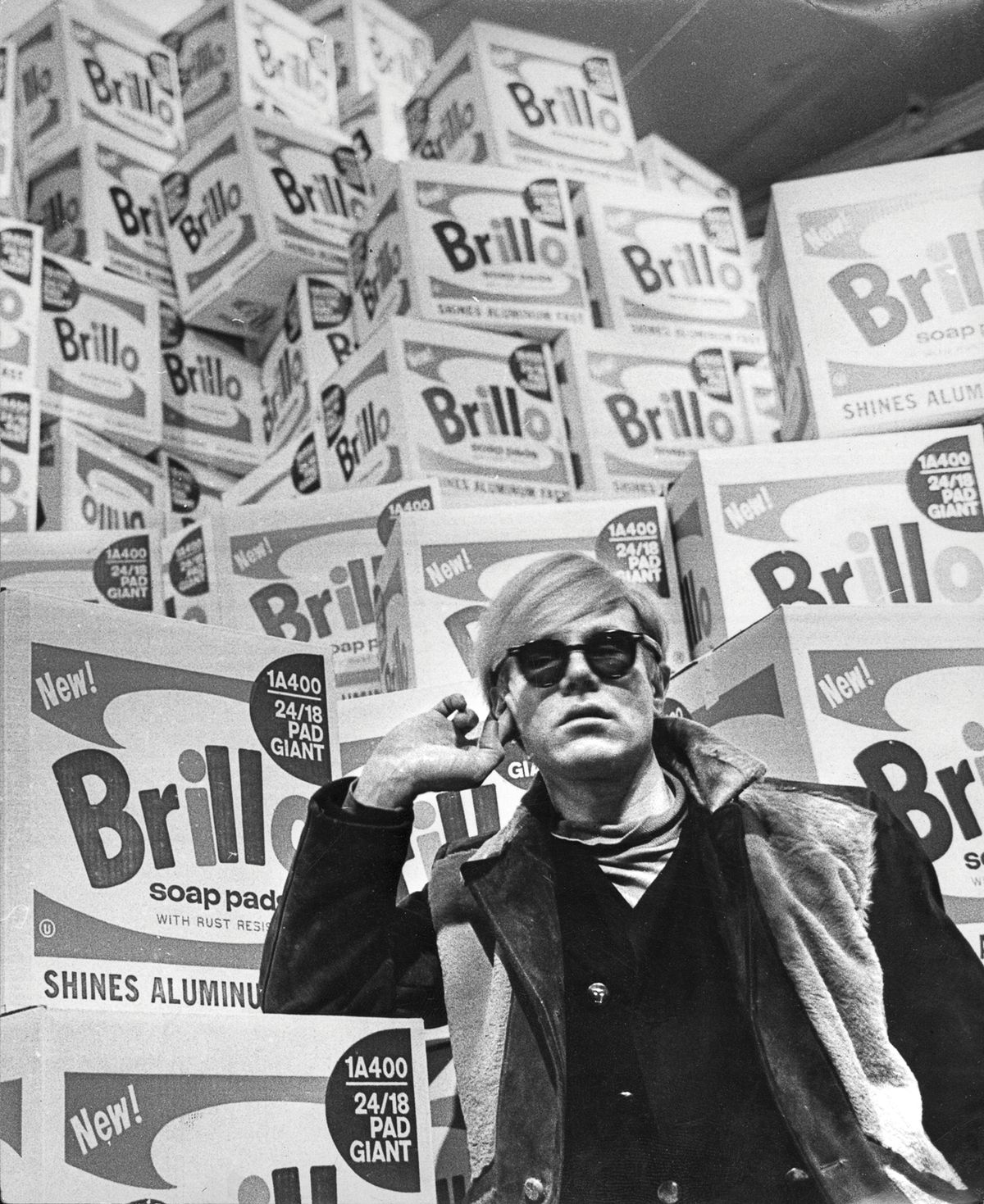 Andy Warhol at the Moderna Museet in 1968 with his original Brillo Boxes (1964) © 1968; Lasse Olsson/DN/Scanpix
