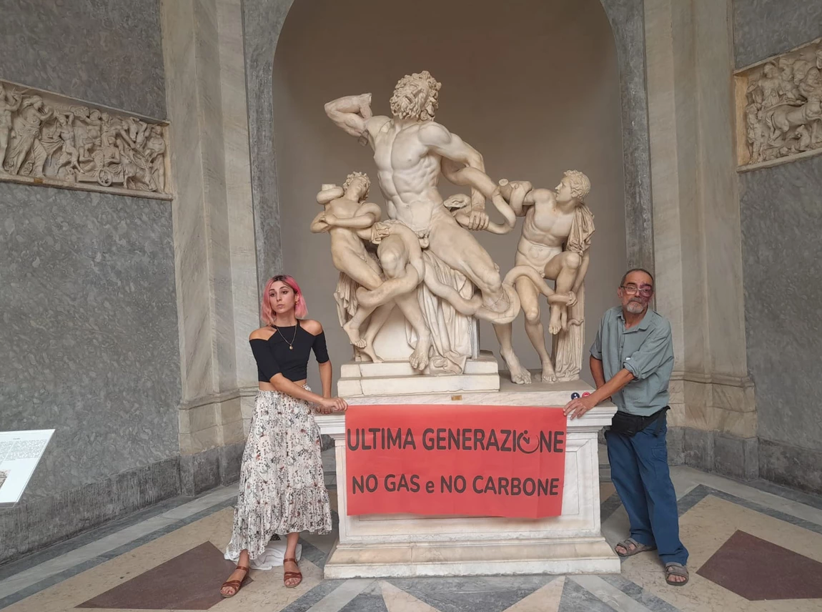 Climate activists in Italy glue themselves to ancient Vatican Museums sculpture