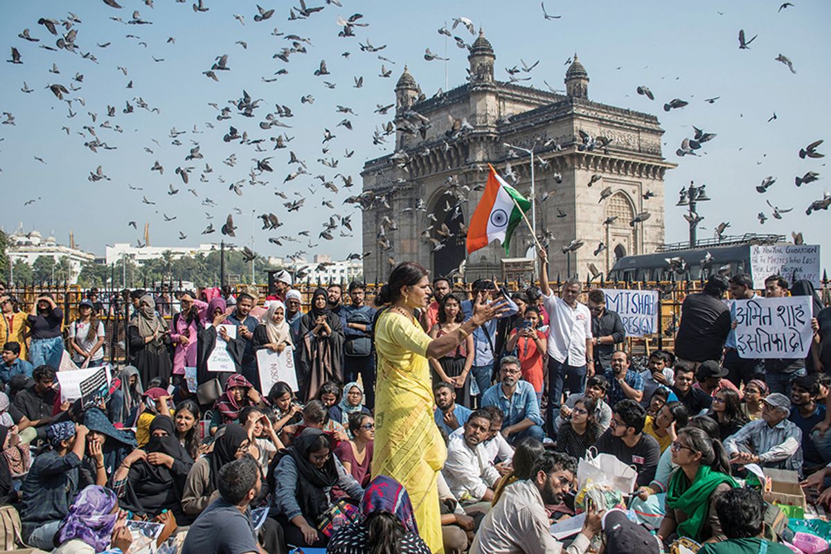 Protesters against the recent attacks on JNU students and teachers gather at the Gateway of India in Mumbai Pratik Chorge/Hindustan Times via Getty Images