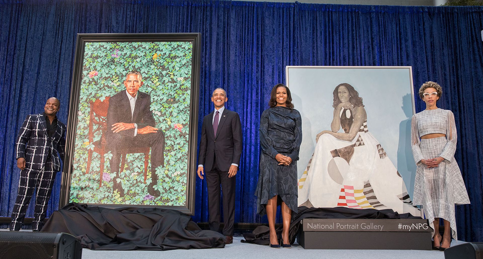 Former President Barack and First Lady Michele Obama (centre) stand with the artists Kehinde Wiley and Amy Sherald in front of their official portraits during a ceremony at the Smithsonian's National Portrait Gallery Photo: Pete Souza